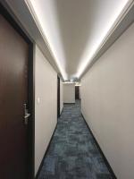 a corridor of an office building with a hallway at Hotel Puri in Taipei
