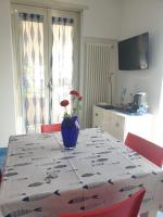 Televízia a/alebo spoločenská miestnosť v ubytovaní SOGNO BLU suite