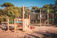 a park with a playground with a play structure at Le Phare in Les Portes