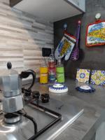 Kuchnia lub aneks kuchenny w obiekcie Etna Bella Home
