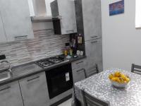 Kuchnia lub aneks kuchenny w obiekcie Etna Bella Home
