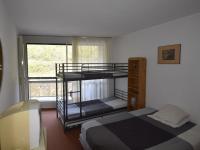 Łóżko lub łóżka w pokoju w obiekcie Charmant 2P au Pied des Pistes avec Parking - 6 Personnes - FR-1-689-67