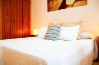 Postel nebo postele na pokoji v ubytování La Concha Beach apartament