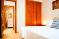 Postel nebo postele na pokoji v ubytování La Concha Beach apartament