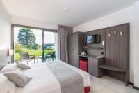 Łóżko lub łóżka w pokoju w obiekcie Hotel Domaso