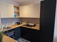 A kitchen or kitchenette at Апартамент RESORT SENSATION 3