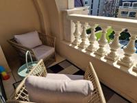 A seating area at Апартамент RESORT SENSATION 3