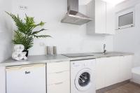 Kuchyň nebo kuchyňský kout v ubytování Home2Book La Casita del Mercado