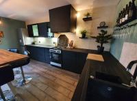 Kuchyňa alebo kuchynka v ubytovaní Cosy home