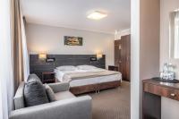 Postel nebo postele na pokoji v ubytování Hotel Leśny