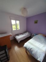 Posteľ alebo postele v izbe v ubytovaní Maison de la foret