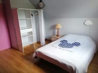 Posteľ alebo postele v izbe v ubytovaní Maison de la foret