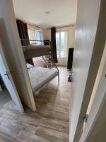 a room with two bunk beds and a hallway at RENT APPART - Colombes in Colombes