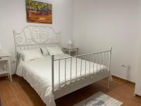 Posteľ alebo postele v izbe v ubytovaní Abades Beach houses by Apartamentos Estrella del Norte