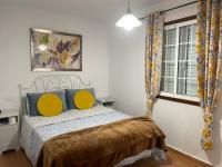 Posteľ alebo postele v izbe v ubytovaní Abades Beach houses by Apartamentos Estrella del Norte