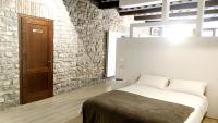 Posteľ alebo postele v izbe v ubytovaní Ikuvium Home