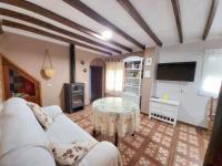 Televízia a/alebo spoločenská miestnosť v ubytovaní Casa El Olivo by CasaTuristica