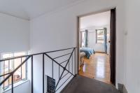 Posteľ alebo postele v izbe v ubytovaní Tiberina Rooftop Trastevere