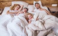 Postel nebo postele na pokoji v ubytování Familienresort Ellmauhof - das echte All Inclusive