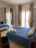 Posteľ alebo postele v izbe v ubytovaní Via Bovio Guest House
