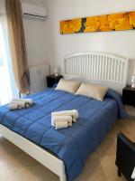 Posteľ alebo postele v izbe v ubytovaní Via Bovio Guest House