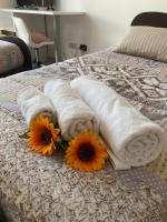 Posteľ alebo postele v izbe v ubytovaní Via Bovio Guest House