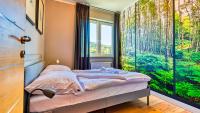 Posteľ alebo postele v izbe v ubytovaní Apartamenty Cicha by Royal Aparts