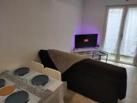 Televízia a/alebo spoločenská miestnosť v ubytovaní T2 Duplex Pamiers Plein Centre - Logement entier - Nouveau