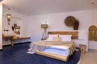 Posteľ alebo postele v izbe v ubytovaní Infinity Blue Suites & Spa
