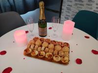 Nápoje v ubytovaní Évasion romantique avec jacuzzi intérieur