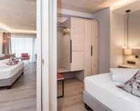 Posteľ alebo postele v izbe v ubytovaní Aktiv Hotel Schweizerhof Kitzbühel