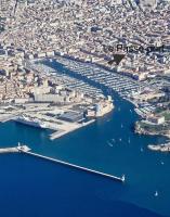 an aerial view of a harbor with boats in the water at Le Passe-Port pour Marseille in Marseille