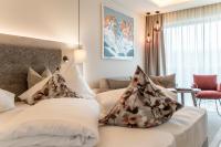 Posteľ alebo postele v izbe v ubytovaní Aktiv Hotel Schweizerhof Kitzbühel