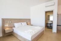 Posteľ alebo postele v izbe v ubytovaní Bella Karpathos Villas