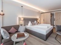 Posteľ alebo postele v izbe v ubytovaní Aktiv Hotel Schweizerhof Kitzbühel