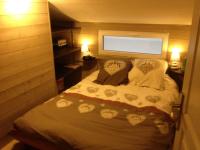 Łóżko lub łóżka w pokoju w obiekcie Menuires, Beau duplex 8 personnes, Ski aux pieds