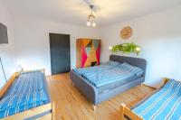 Postel nebo postele na pokoji v ubytování Apartament Latynoski z ogrodem - Dream Apart