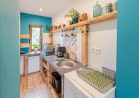 Kuchyň nebo kuchyňský kout v ubytování Apartament Latynoski z ogrodem - Dream Apart