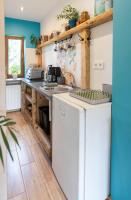 Kuchyň nebo kuchyňský kout v ubytování Apartament Latynoski z ogrodem - Dream Apart