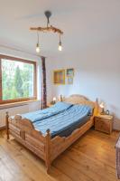 Postel nebo postele na pokoji v ubytování Apartament Latynoski z ogrodem - Dream Apart