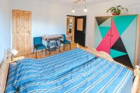 Postel nebo postele na pokoji v ubytování Apartament Latynoski z ogrodem - Dream Apart