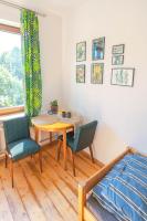 Postel nebo postele na pokoji v ubytování Apartament Latynoski z ogrodem - Dream Apart