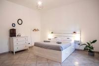 A bed or beds in a room at Casa Futura Trastevere