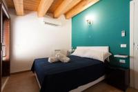 Posteľ alebo postele v izbe v ubytovaní Verdirooms158