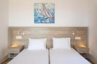 Posteľ alebo postele v izbe v ubytovaní Bella Karpathos Villas