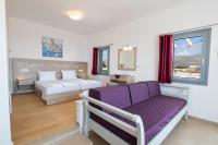 Posteľ alebo postele v izbe v ubytovaní Bella Karpathos Villas