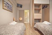 Posteľ alebo postele v izbe v ubytovaní Modern Hospitality- apt near Children's Hospital