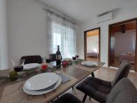 Posedenie v ubytovaní Apartments Nono