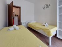Posteľ alebo postele v izbe v ubytovaní Apartments Nono