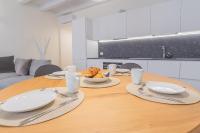 The floor plan of Modern & Stylish Apartment in Como City by Rent All Como